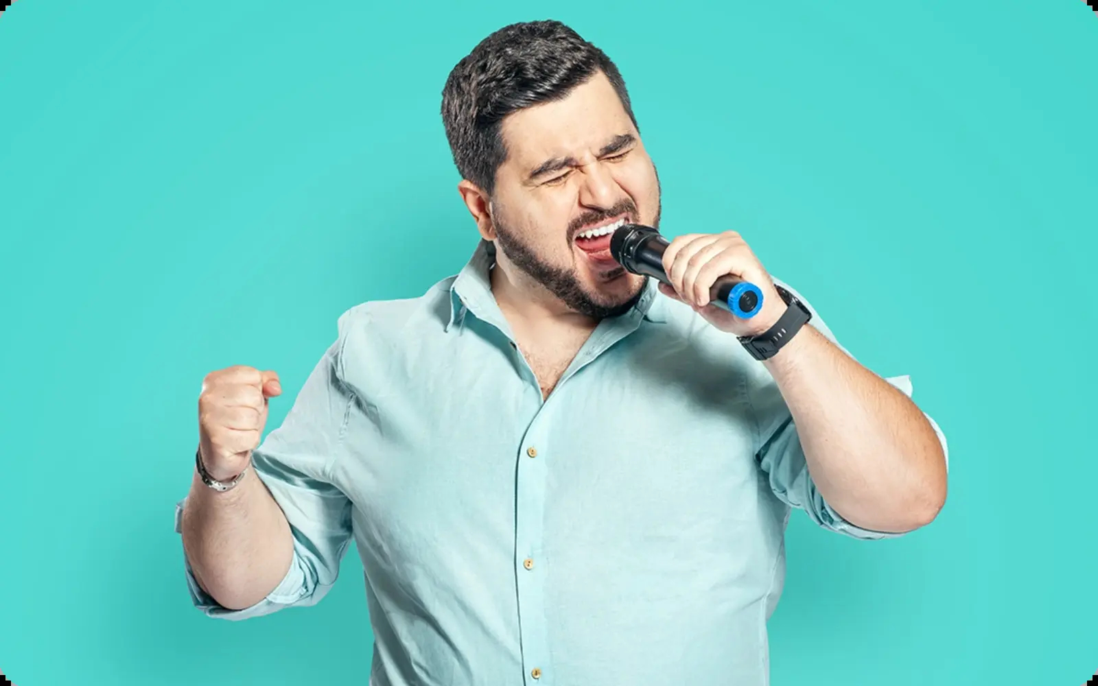 Ventsislav Dukov from Amusnet singing on a microphone for our jobs and application website
