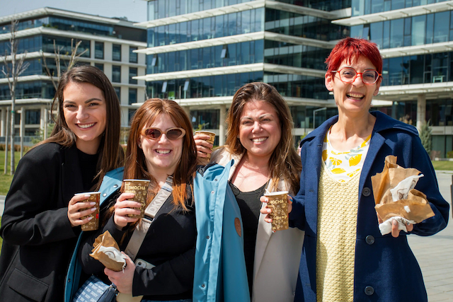 Amusnet employees celebrating together